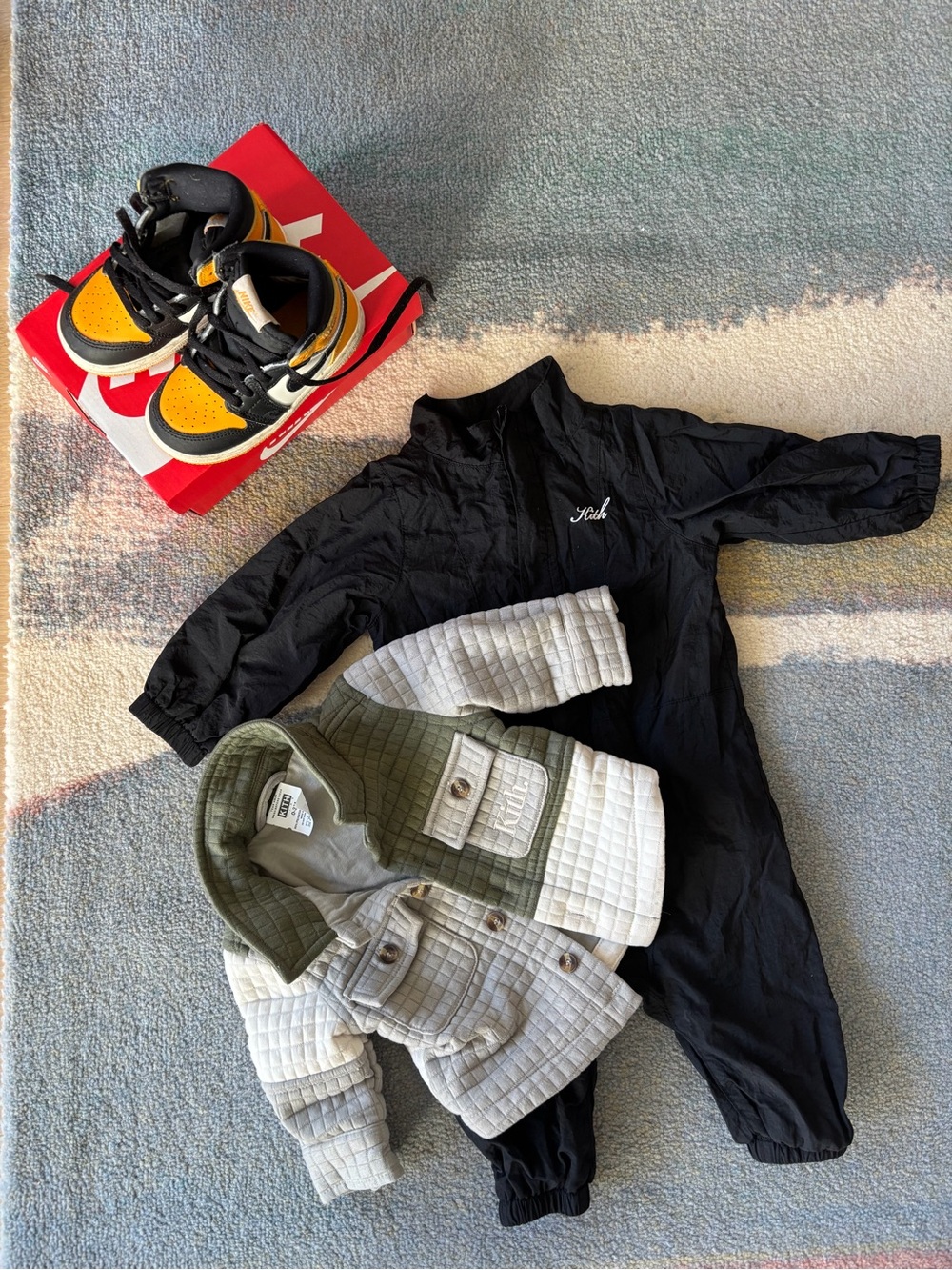 Kith Quilted Jacket in Olive Green and Light Gray and Black Jumpsuit